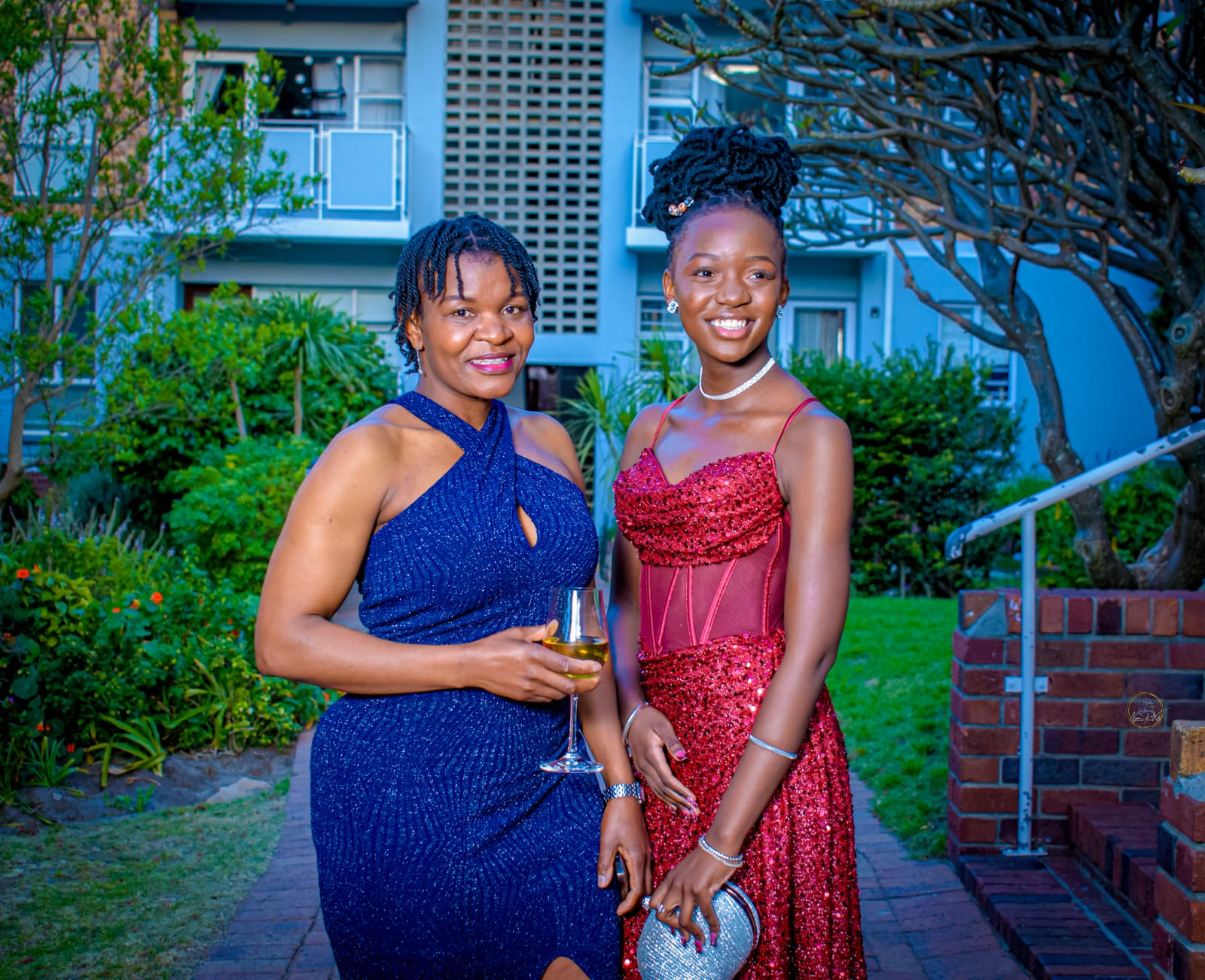 Mother and daughter portrait at sunset