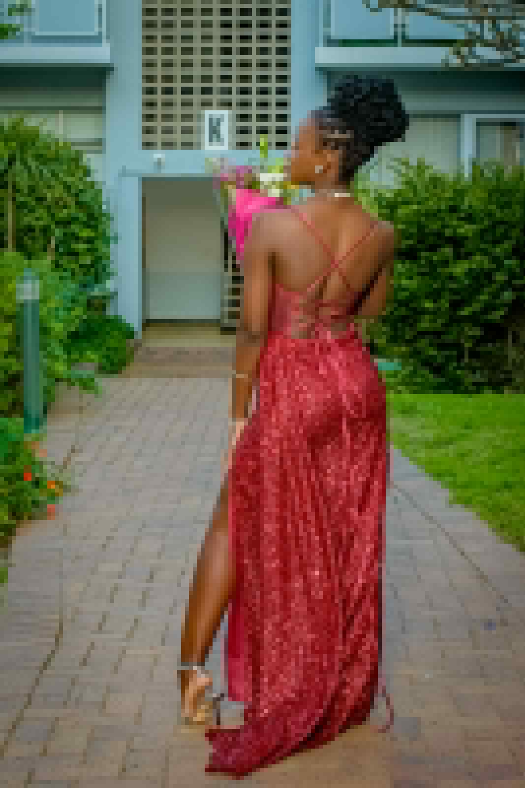 Back portrait of a flowing red gown